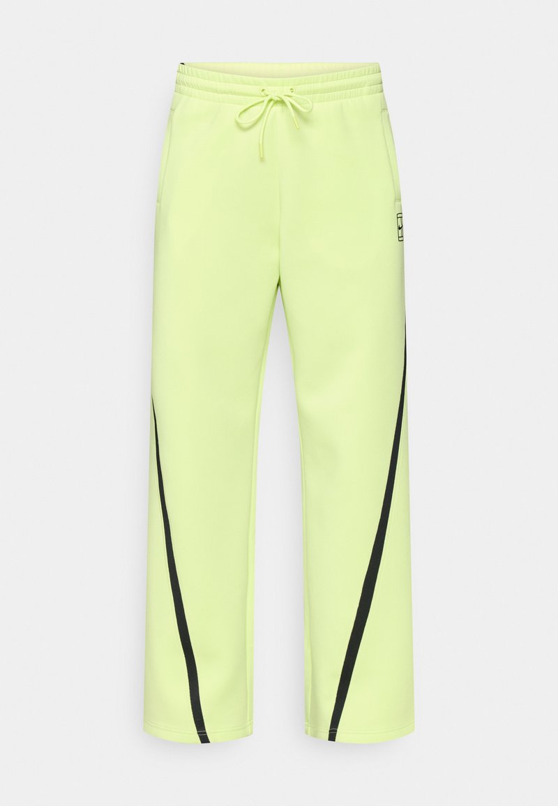 Limettengrüne Sporthose mit elastischem Bund, Kordelzug und schwarzen diagonalen Akzenten. Hergestellt aus einem glatten, dehnbaren Material.