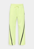 Nike Performance NIKECOURT ADVANTAGE - Tracksuit bottoms - lemon twist/black
