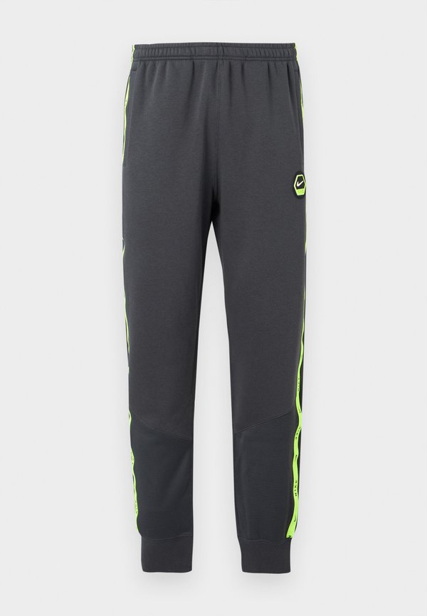 Nike Sportswear JOGGER - Tracksuit bottoms - smoke grey