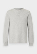 Hellgraues langärmliges Thermoshirt mit rundem Ausschnitt und dreiknöpfiger Knopfleiste, mit gerippten Bündchen und strukturiertem Strickstoff.