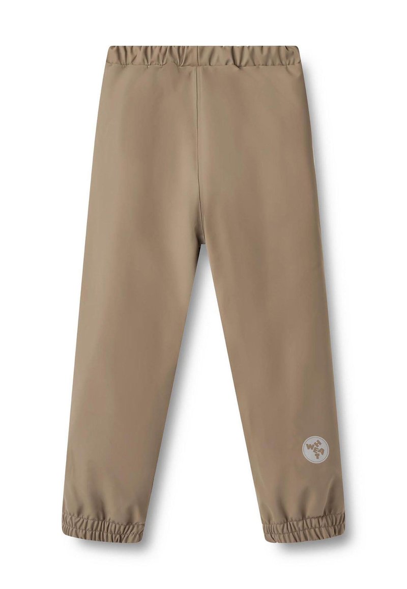 Beige Hose mit elastischem Bund und gerafften Bündchen, mit einem runden weißen Logo am unteren Bein. Glatter, leichter Stoff.