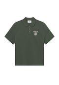 Dunkelgrünes Poloshirt aus Baumwolle mit kurzen Ärmeln, Drei-Knopf-Leiste und gesticktem "Yale"-Logo auf der linken Brust.
