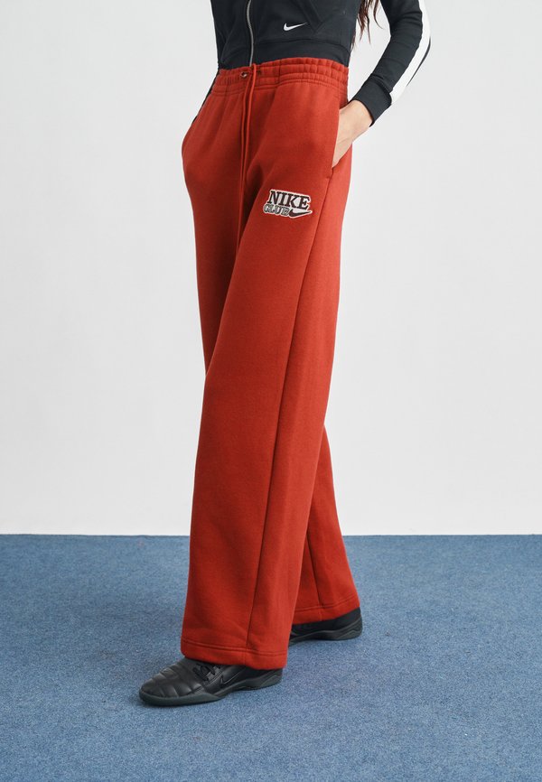 Nike Sportswear Tracksuit bottoms - noble red