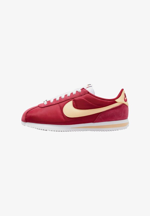 Nike Performance NIKE CORTEZ UNISEX - Training shoe - team crimson   white   ice peach