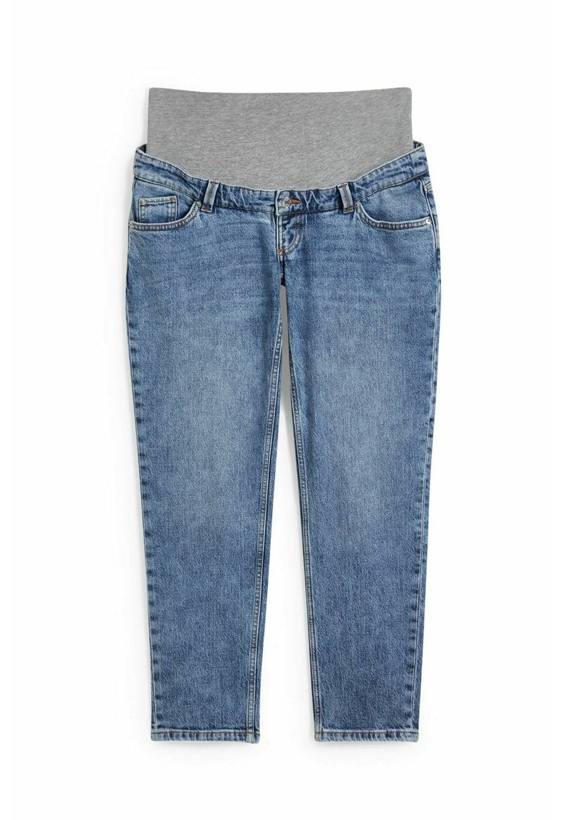 Hellblaue Denim-Jeans mit einem grauen elastischen Bund. Sie verfügen über fünf Taschen und gerade Beine, mit subtilen Auswaschungen und Nähdetails.