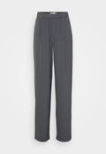 Graue, plissierte, weit geschnittene Hose mit elastischem Bund, aus einem glatten Stoff gefertigt. Hat ein sauberes Design und keine sichtbaren Beschläge.