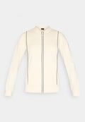 Reißverschlussjacke in Cremefarbe mit langen Ärmeln, Stehkragen und vertikalen dunklen Paspel-Details entlang des Reißverschlusses und an den Seiten.