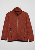 Orangefarbene, strukturierte Jacke mit hohem Kragen, vollem Reißverschluss und zwei seitlichen Reißverschlusstaschen. Mit schwarzen Reißverschlussakzenten und Markenlogo.