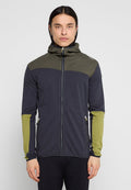 Hemdjacke mit dunklem Marineblau-Körper und olivgrünen Akzenten auf den Schultern und Ärmeln. Mit Reißverschluss und zwei Seitentaschen.