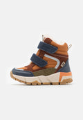 Dunkelblaue und braune mid-top Sneaker mit Klettverschlüssen, aus Textil- und Wildledermaterialien, gepolstertem Innenraum und einer robusten Gummisohle.