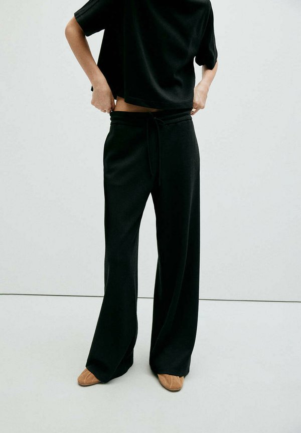 Mango ADULT - Tracksuit bottoms - black