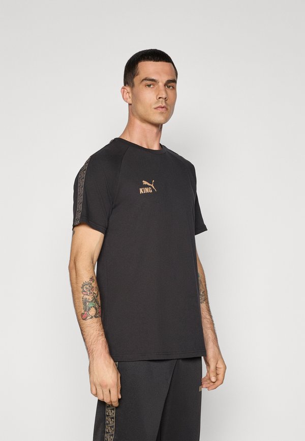 Puma KING TEE - Sports T-shirt - black/matte gold-coloured/white