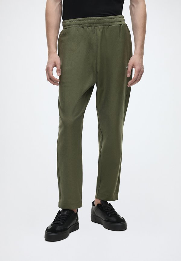 Calvin Klein PREMIUM MICRO LOGO  - Tracksuit bottoms - olive night