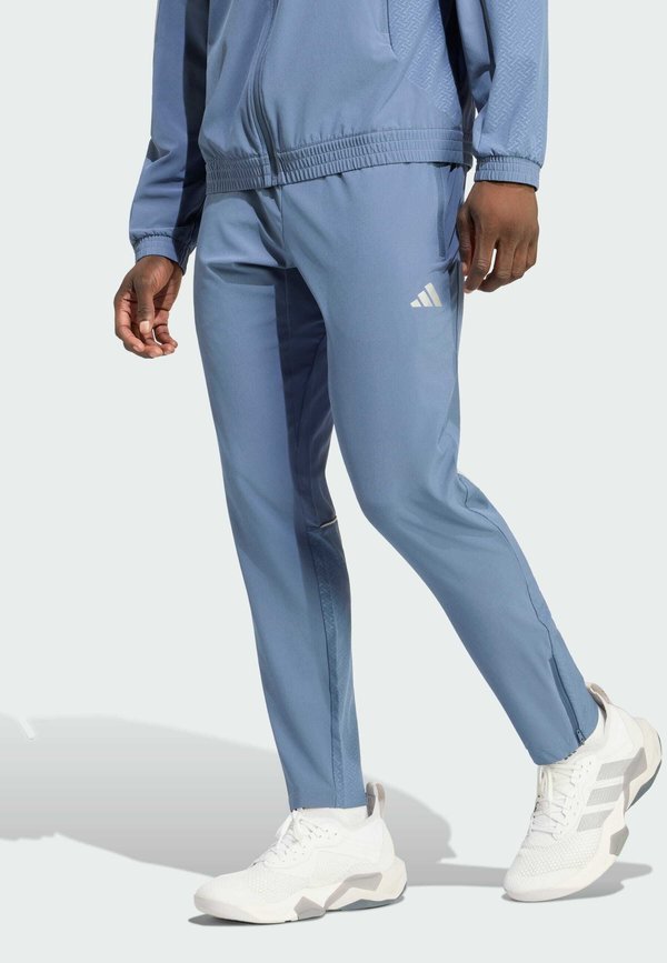 adidas Performance ADIDAS PERFORMANCE TECH APPAREL SLIM TRACKPANT - Tracksuit bottoms - preloved ink