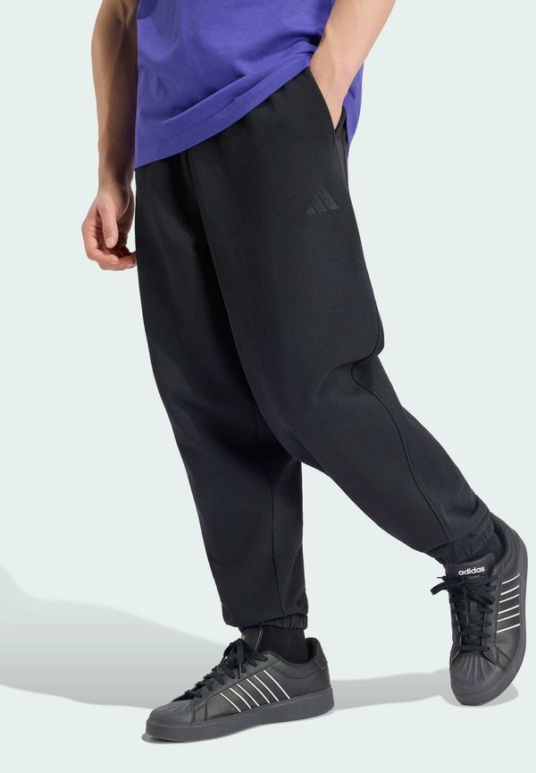 adidas Sportswear ADIDAS SPORTSWEAR M AK SL R CF PT - Tracksuit bottoms - black