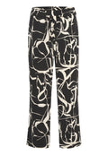 Schwarz-weiße gemusterte Hose mit lockerer Passform, ausgestattet mit einem elastischen Bund, Kordelzug-Detail und abstraktem Linienmuster.