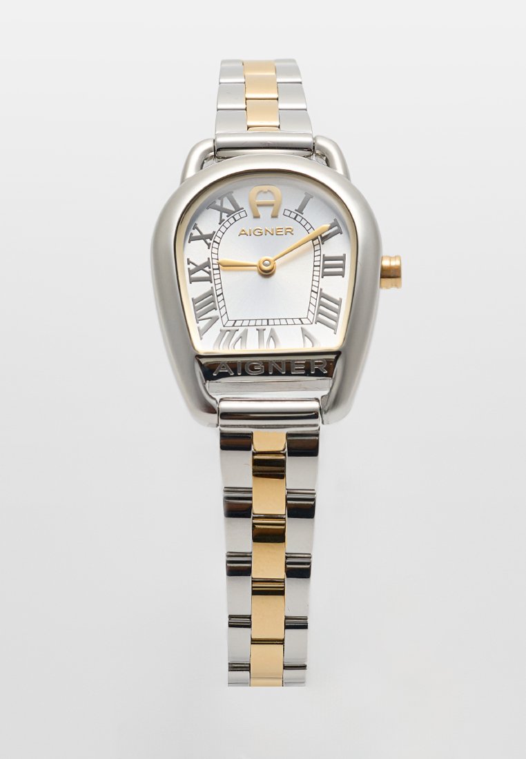 Silberne und goldene Aigner Armbanduhr mit hufeisenförmigem Zifferblatt, römischen Zahlen, goldenen Zeigern und Metallgliedarmband.