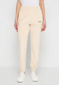 Beige Jogginghosen aus Baumwolle mit elastischem Bund und Bündchen. Verfügt über seitliche Taschen und ein in Dunkelbraun auf den linken Oberschenkel gedrucktes Logo.