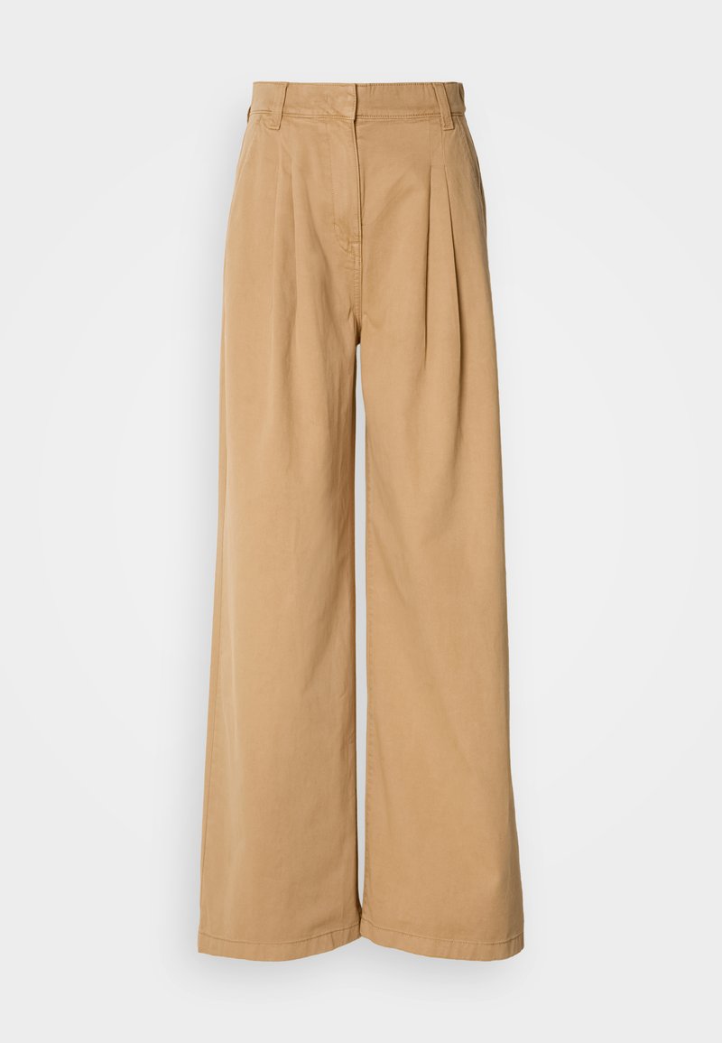 Weite Hosen aus braunem Baumwollstoff mit Falten an der Taille, hoher Taille und glatter Textur. Keine sichtbaren Beschläge oder Muster.