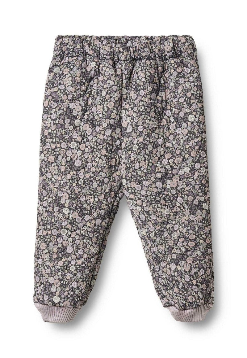 Blumengemusterte Hosen in Dunkelgrau mit einem elastischen Bund und gerippten Bündchen. Enthält verschiedene Pastellblumen auf dem gesamten Stoff.