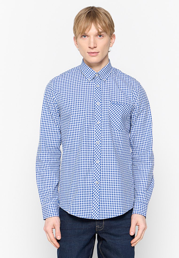 Blau-weiße karierte Button-Down-Hemd, lange Ärmel, eine Fronttasche, geknöpfter Kragen, glattes Baumwollmaterial, entspannte Passform.