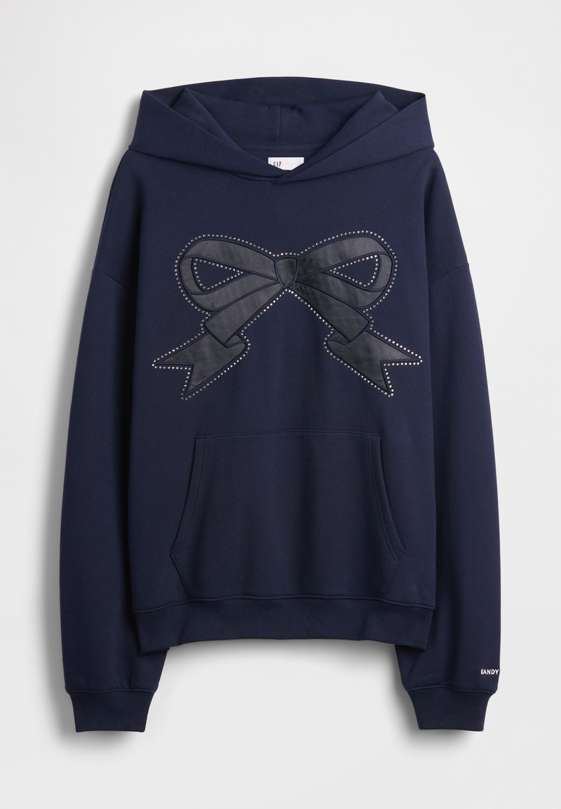 Marineblauer Kapuzenpullover mit großem schwarzem Leder-Schleifendesign und Nietenakzenten. Enthält eine Kängurutasche vorne und gerippte Bündchen.