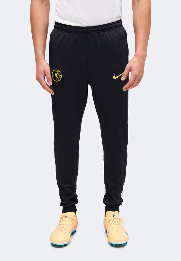 Nike Performance CFC - Tracksuit bottoms - pitch blue/white/midwest gold-coloured