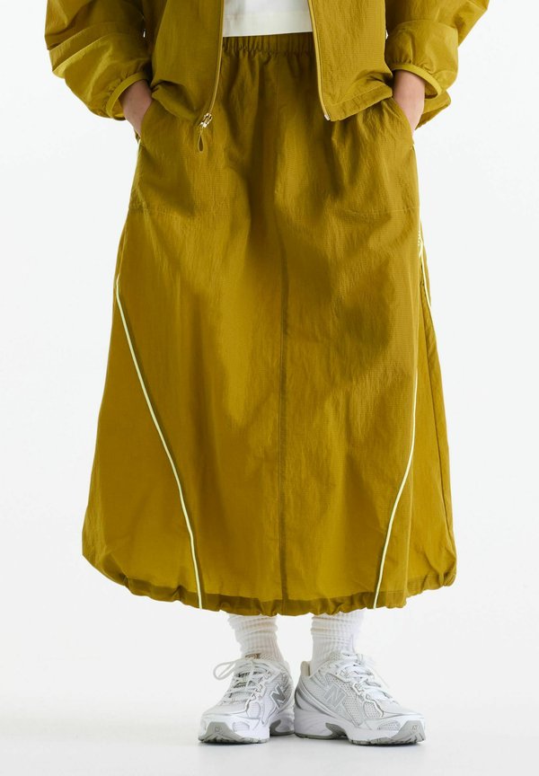 New Balance SPORT LEGACY SKIRT - A-line skirt - basil oil