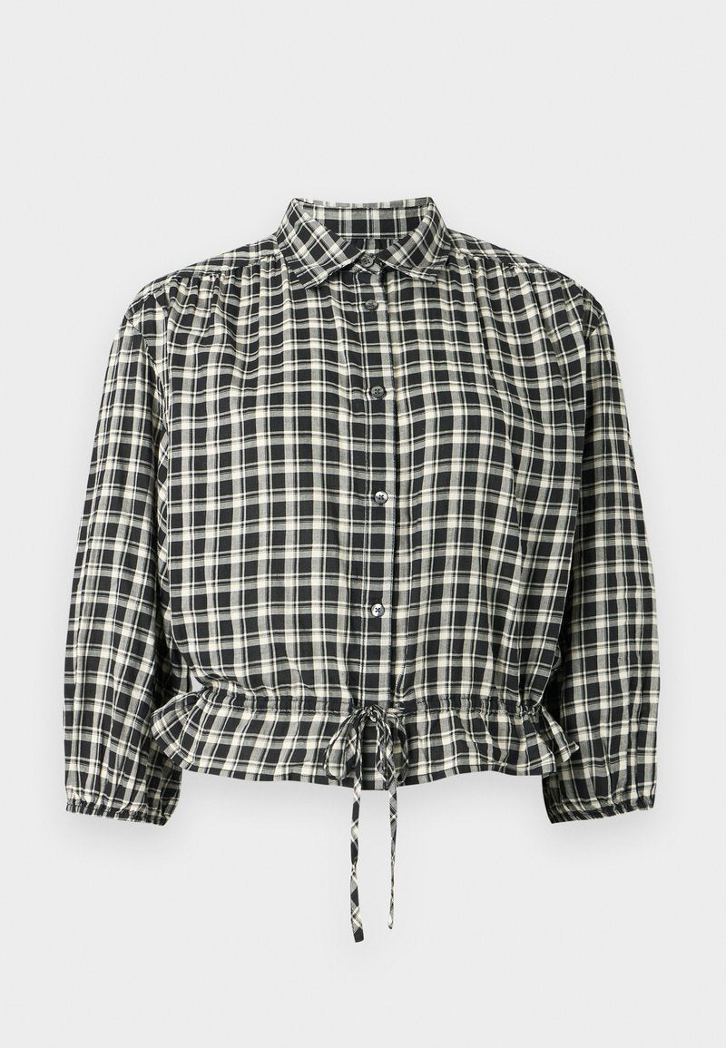 Schwarz-creme karierte Bluse mit Kragen, Knopfverschluss und elastischem Bund mit Kordelzug. Lange Ärmel mit Manschetten.