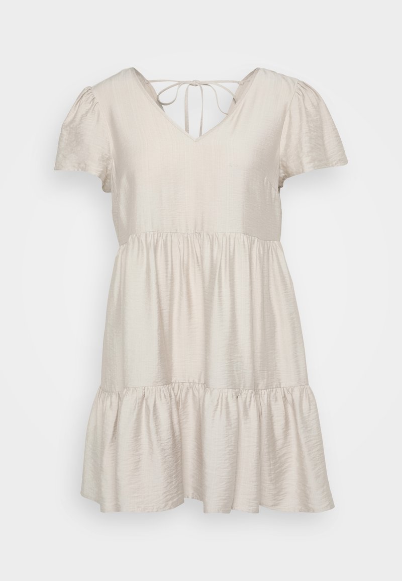 Beige Kurzarmkleid mit V-Ausschnitt, das einen taillierten Oberkörper und einen schwingenden, gestuften Rock hat, der oberhalb des Knies endet. Mit Bindebändern am Nacken.