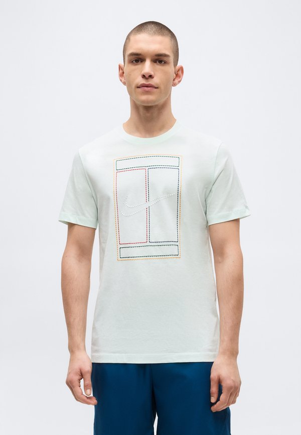 Nike Performance COURT TEE HERITAGE - Print T-shirt - barely green
