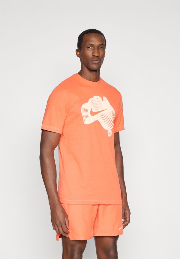 Nike Performance NIKECOURT TEE OPEN - Sports T-shirt - turf orange/sail