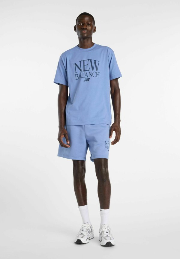 New Balance REIMAGINED 7 - Tracksuit bottoms - fairweather blue