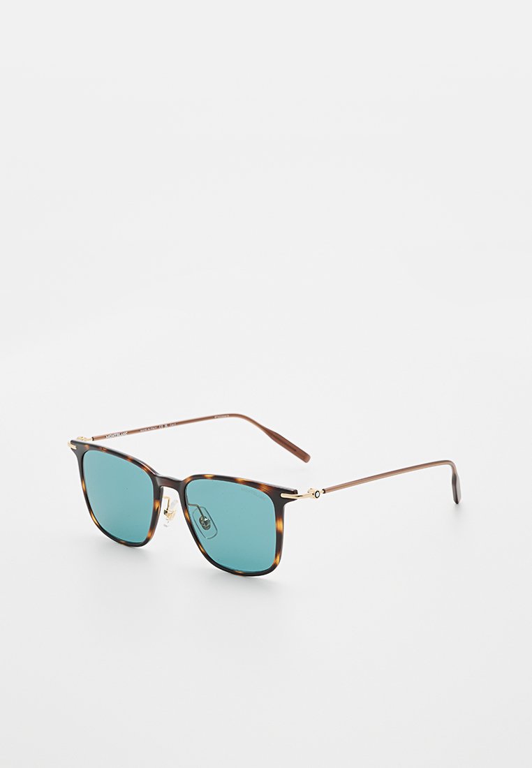 Sonnenbrille mit tortoisefarbigen quadratischen Rahmen, blau getönten Gläsern und dünnen goldenen Metallbügeln vor weißem Hintergrund.