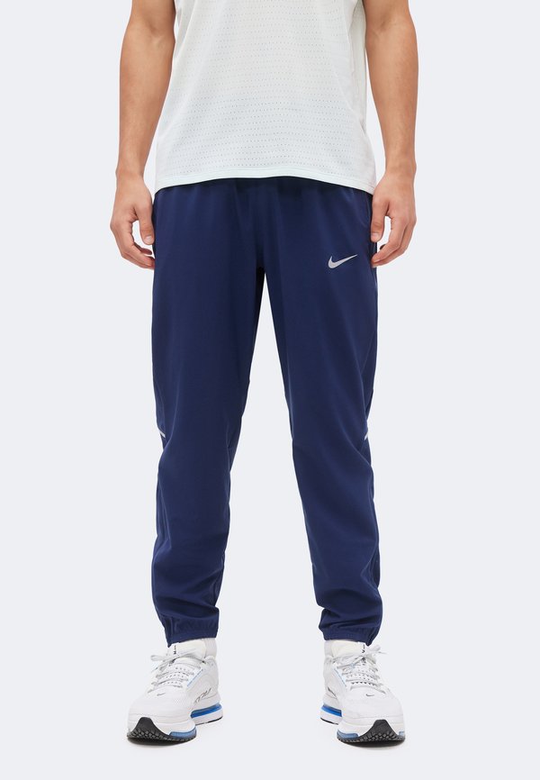 Nike Performance MILER - Tracksuit bottoms - midnight navy