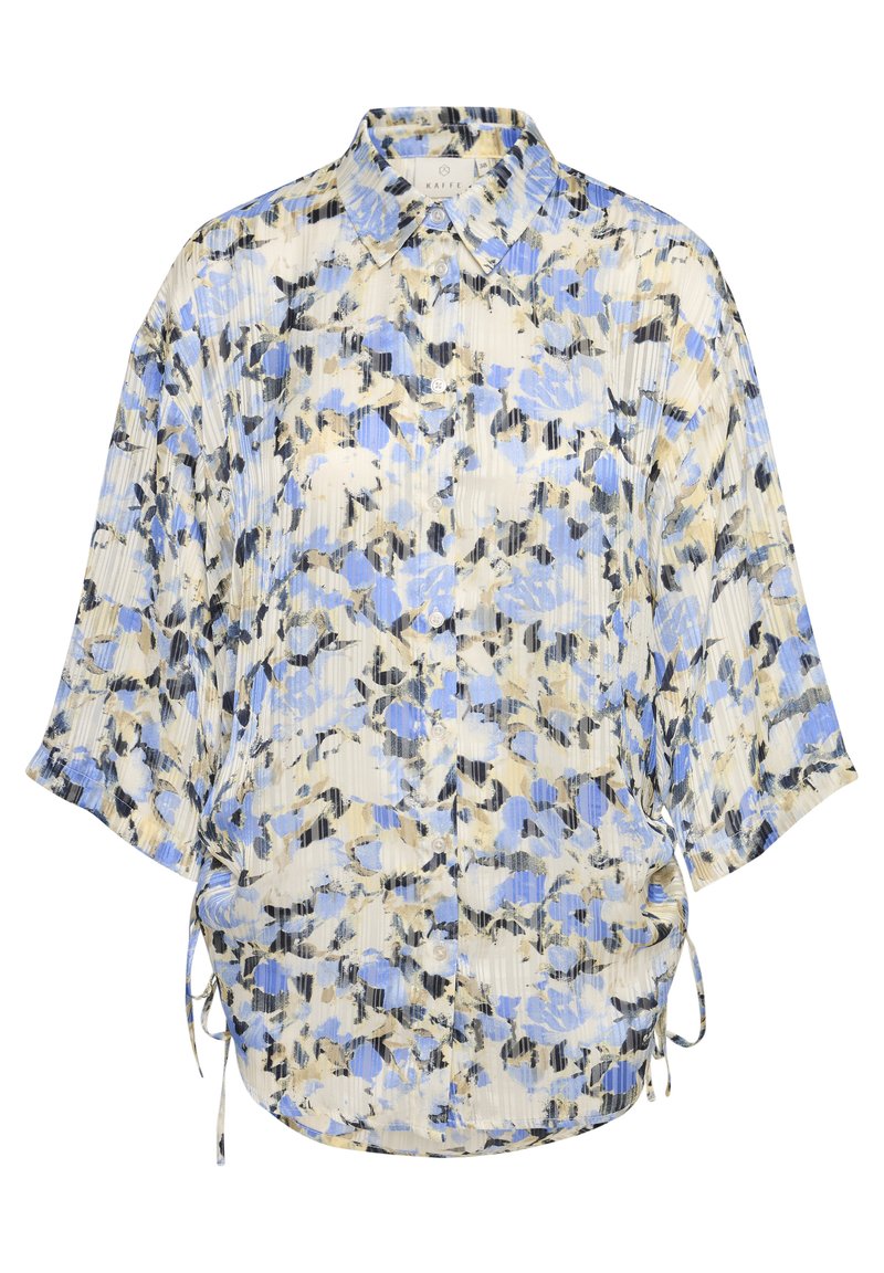 Plisseebluse in Creme mit blauem und schwarzem Blumenmuster. Verfügt über einen Kragen, eine durchgehende Knopfleiste und seitliche Bänder für eine verstellbare Passform. Weicher, leichter Stoff.