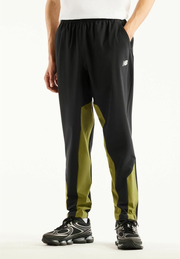New Balance UTILITY STRETCH WOVEN PANT - Tracksuit bottoms - sport green black