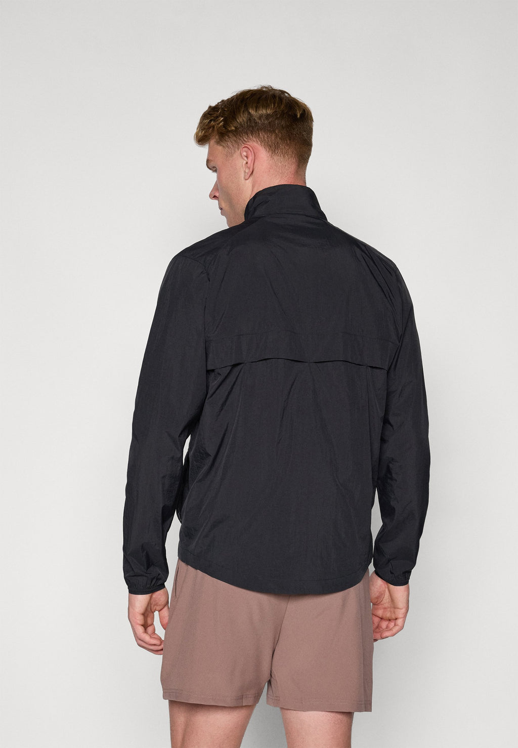 New Balance ATHLETICS REFLECTIVE PACKABLE JACKET