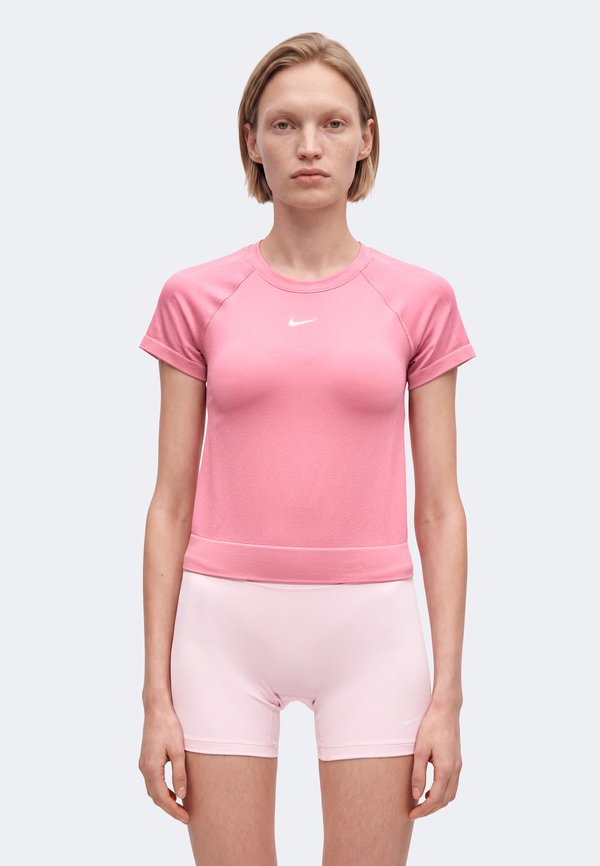 Nike Performance W NP DF SMLS SS TOP WT - Basic T-shirt - peony/white