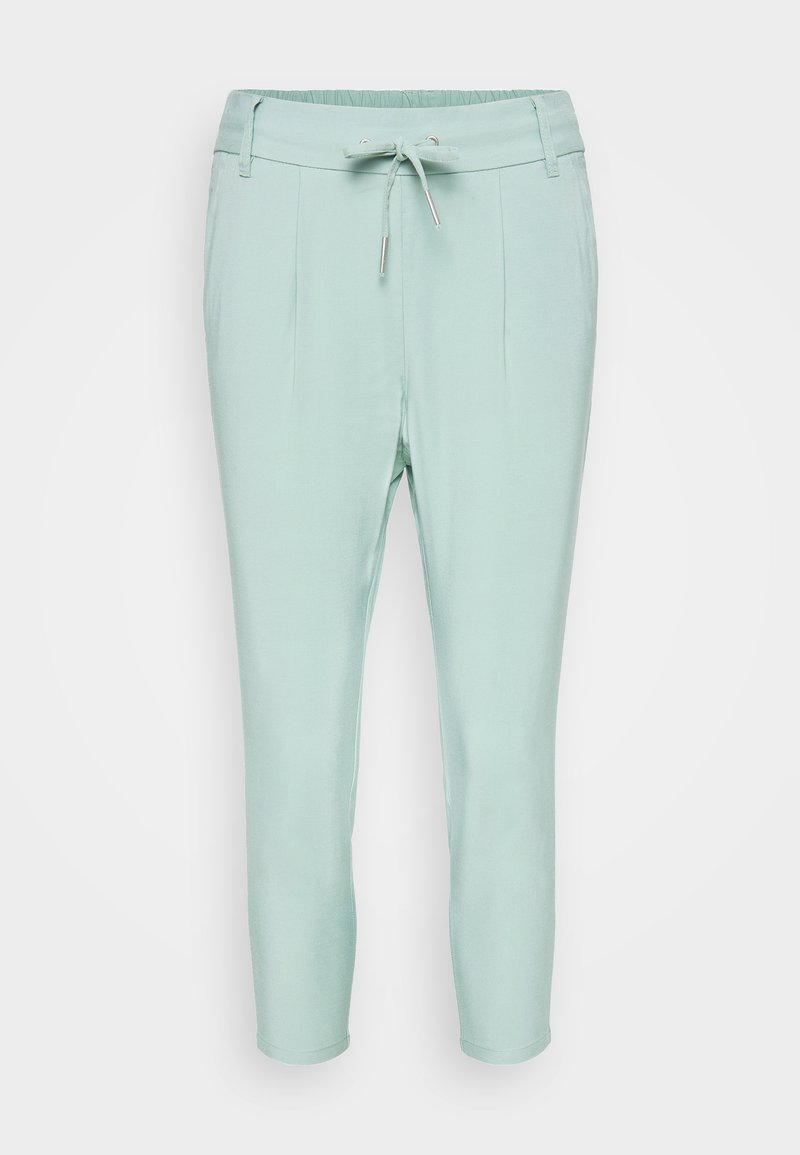 Helle mintgrüne Hose mit elastischem Bund, Kordelzugverschluss und zwei Vordertaschen. Glattes Material mit schmal zulaufendem Bein.