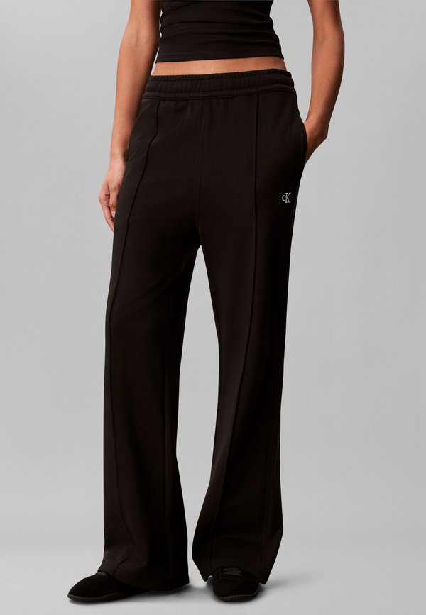 Calvin Klein Jeans MONOGRAM TRACKPANT - Tracksuit bottoms - black