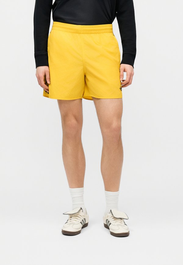 adidas Originals SPRINTER SHORT - Tracksuit bottoms - yellow