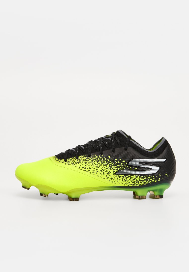 Limettengrüne und schwarze Fußballschuhe mit einer strukturierten Oberseite, die ein Farbverlaufmuster und ein Logo an der Seite aufweisen. Genoppte Laufsohle für besseren Halt.