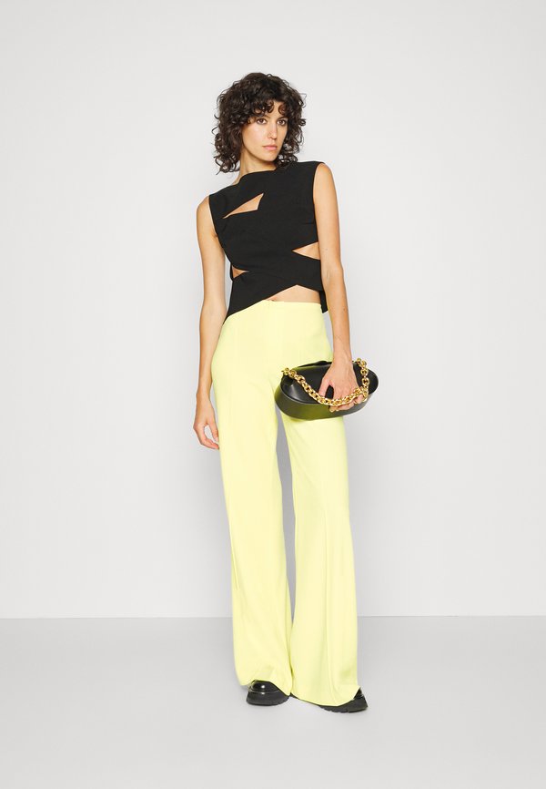 A.W.A.K.E. MODE CRISS CROSS WIDE STRAP IN THE FRONT