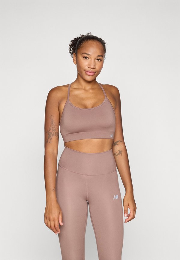 New Balance NB ESSENTIAL YOGA BRA - Light support sports bra - earth shadow