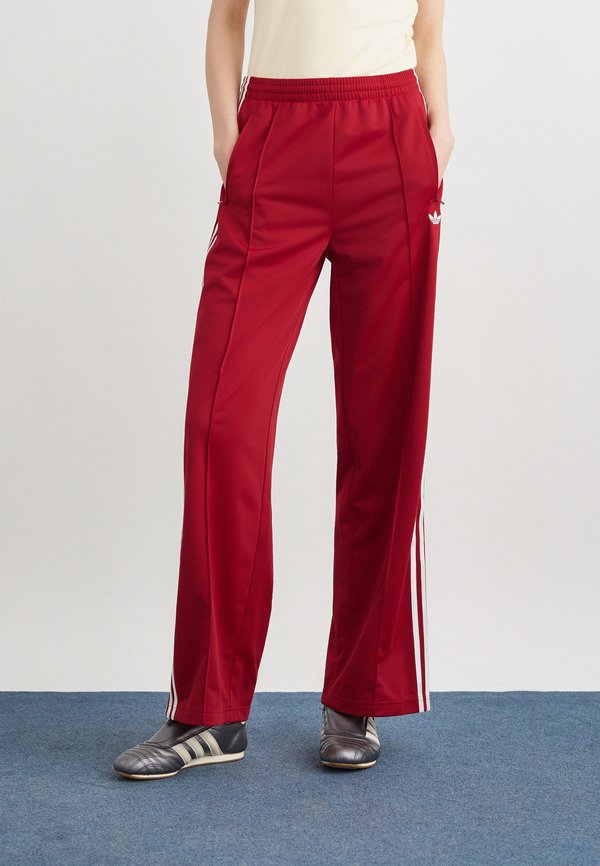 adidas Originals FIREBIRD LOOSE - Tracksuit bottoms - team victory red/white