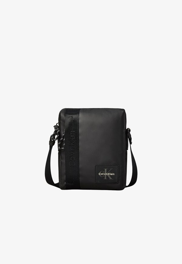 Calvin Klein RUBBERIZED REPORTER - Cross body bag - black