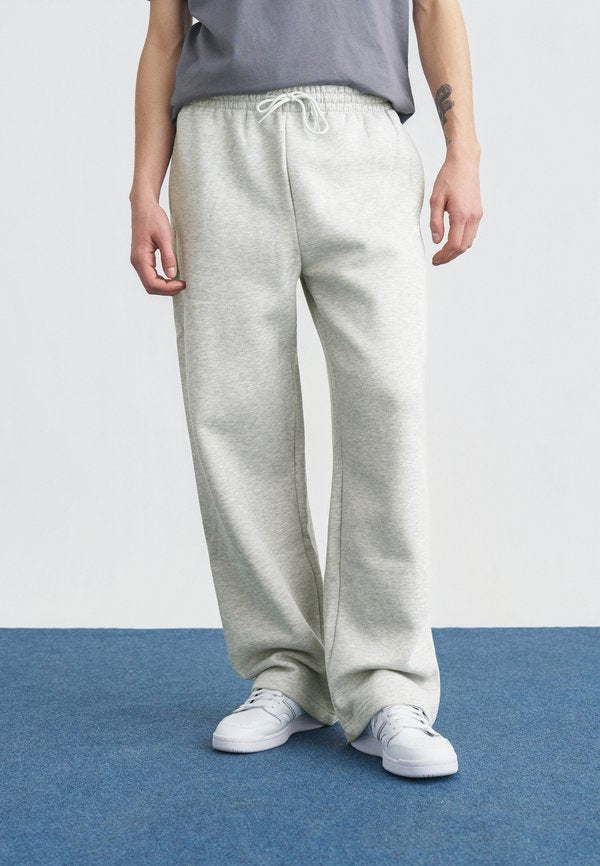 New Balance ESSENTIALS - Tracksuit bottoms - grey