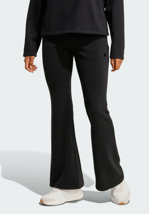 adidas Sportswear SEASONAL ESSENTIALS FLARED - Tracksuit bottoms - black