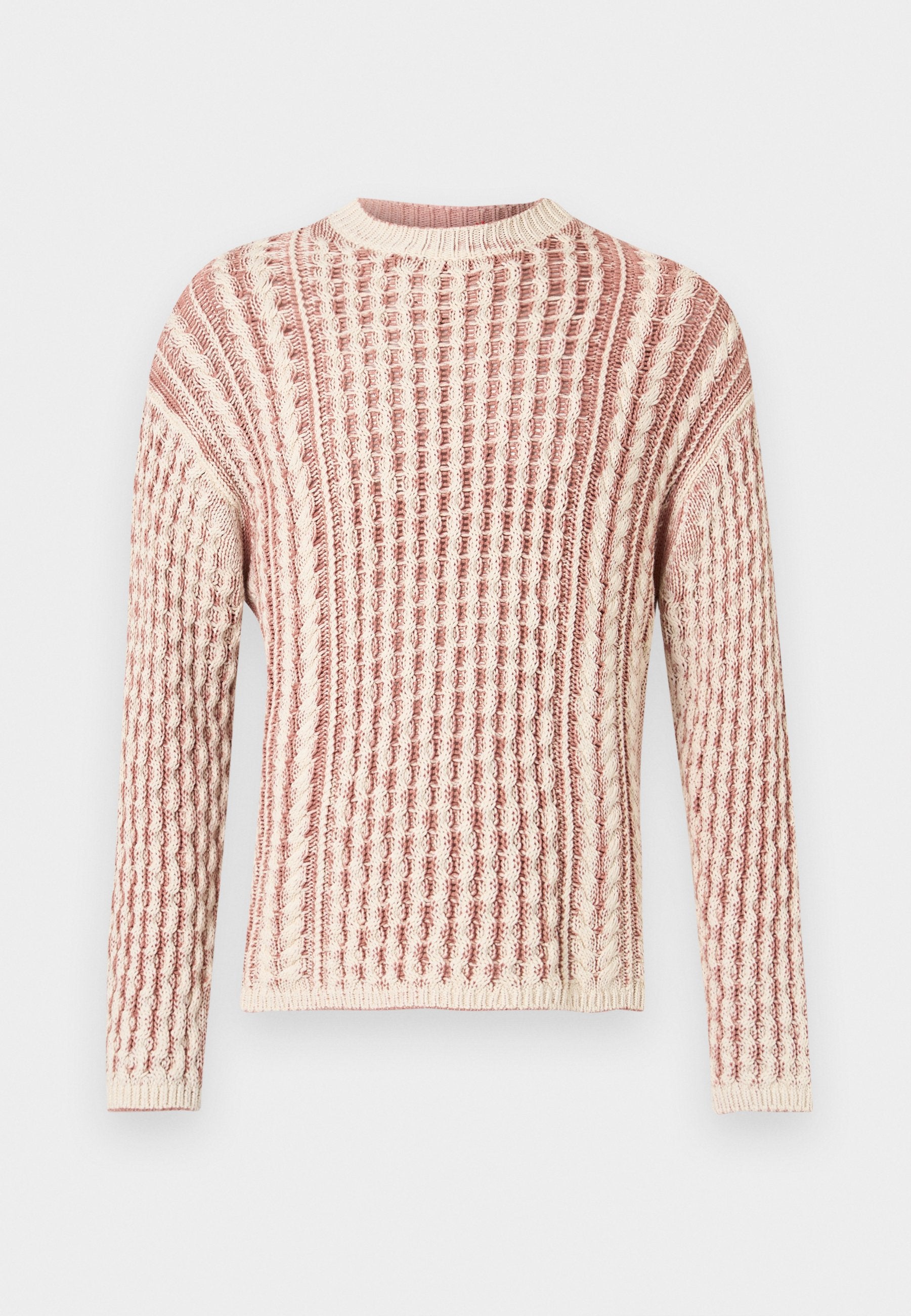 Strukturierter Pullover in sanften Rosa- und Cremetönen, mit einem Rippmuster, Rundhalsausschnitt und langen Ärmeln.